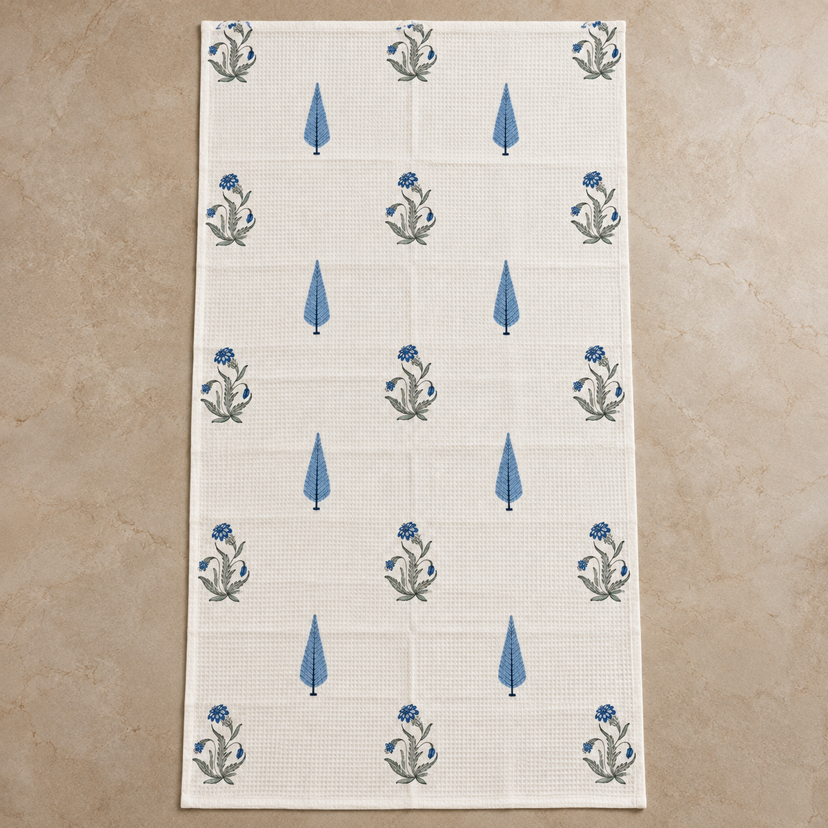 Indigo Leaf Handcrafted Towel laid flat, showing the full pattern